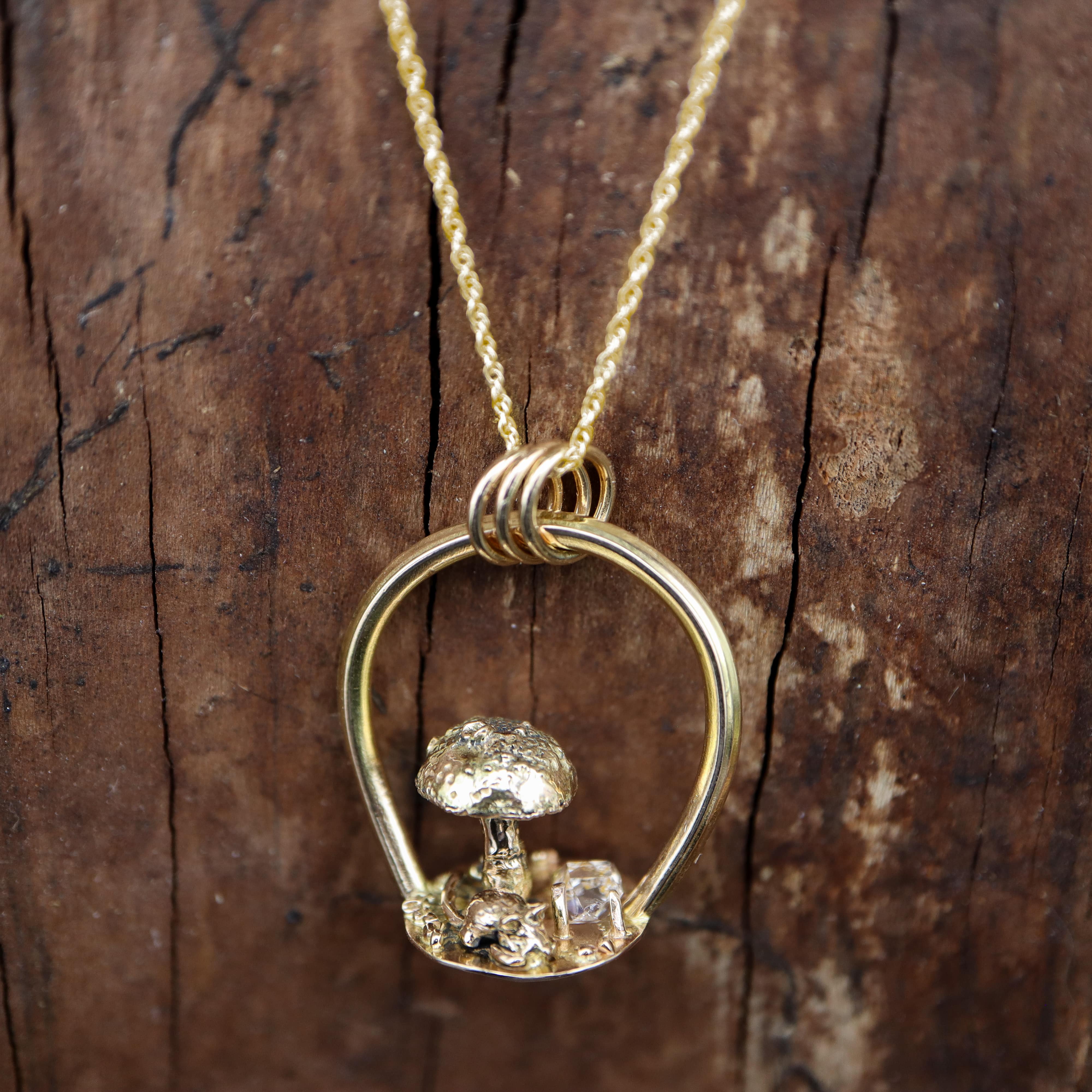The Tiny Golden Mouse Pendant