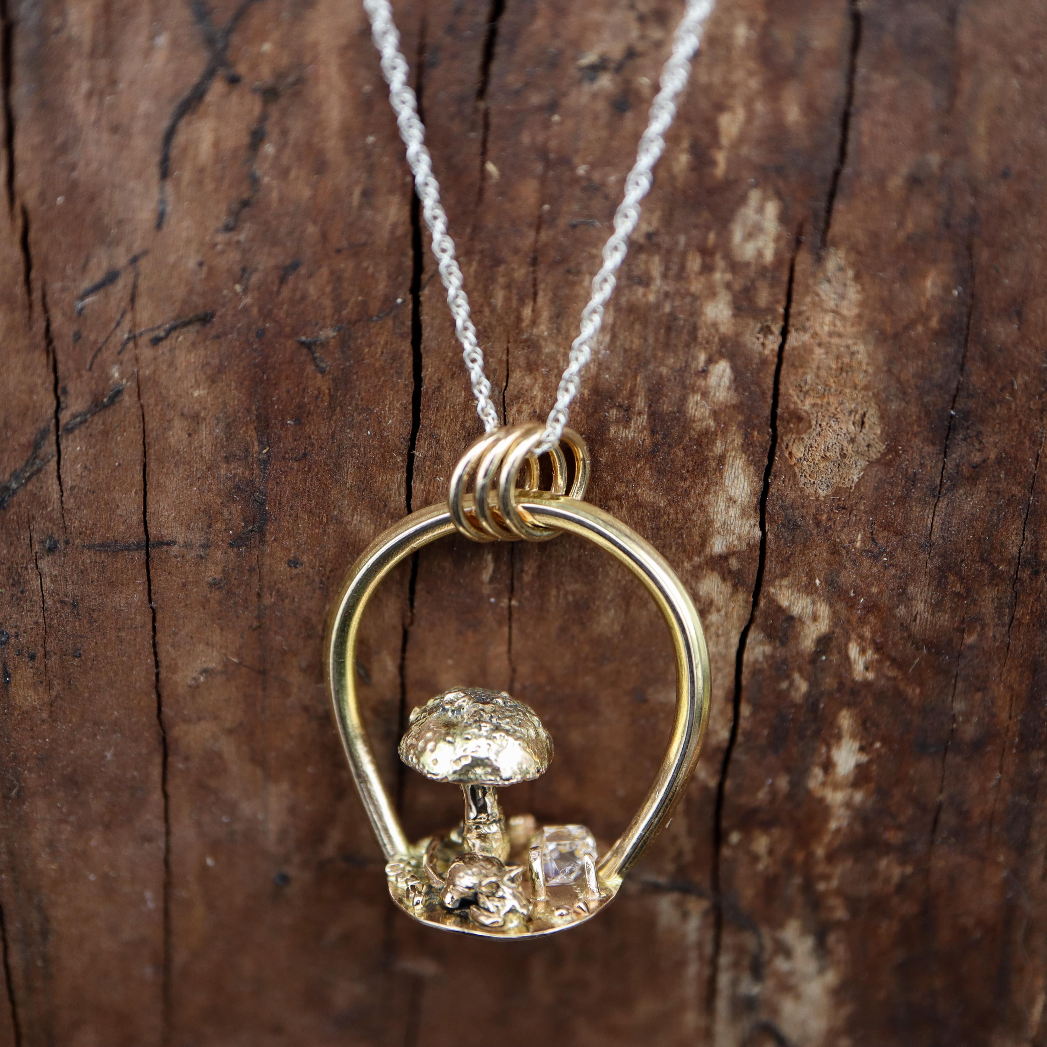 The Tiny Golden Mouse Pendant