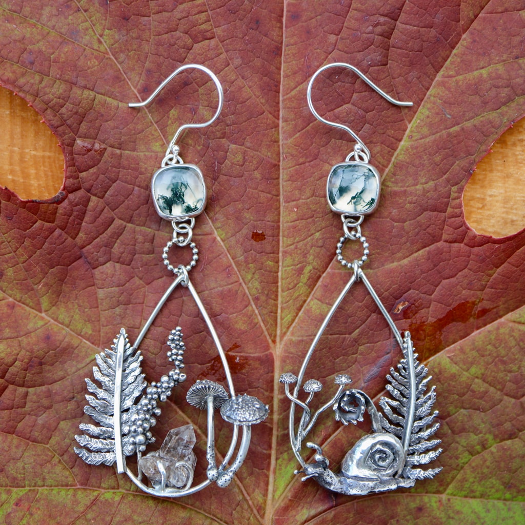 Another view of the snail and Herkimer diamond cluster teardrop hoop earrings.