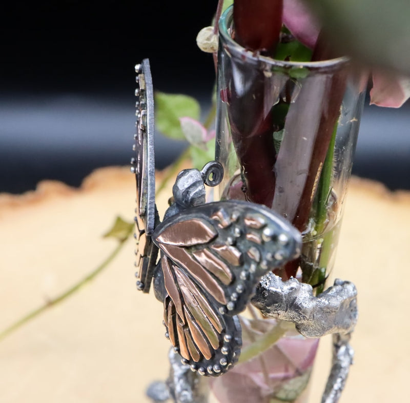 The monarch butterfly was made to have a little twirled tongue. 