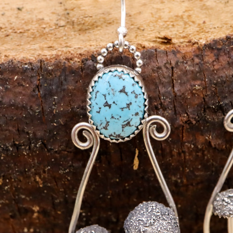 A close up of the light blue turquoise stone. 