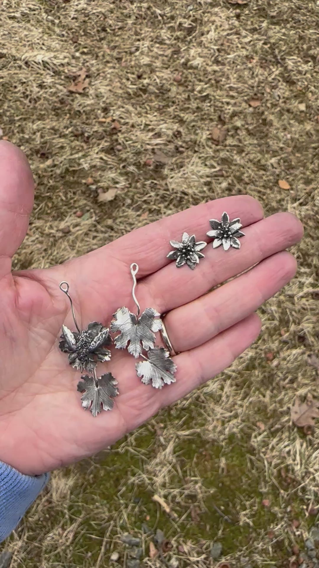 a video showing how you can wear the bee fly and bloodroot flower earrings as dangles or as flower studs. 
