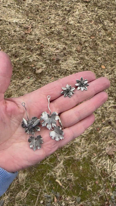 a video showing how you can wear the bee fly and bloodroot flower earrings as dangles or as flower studs. 