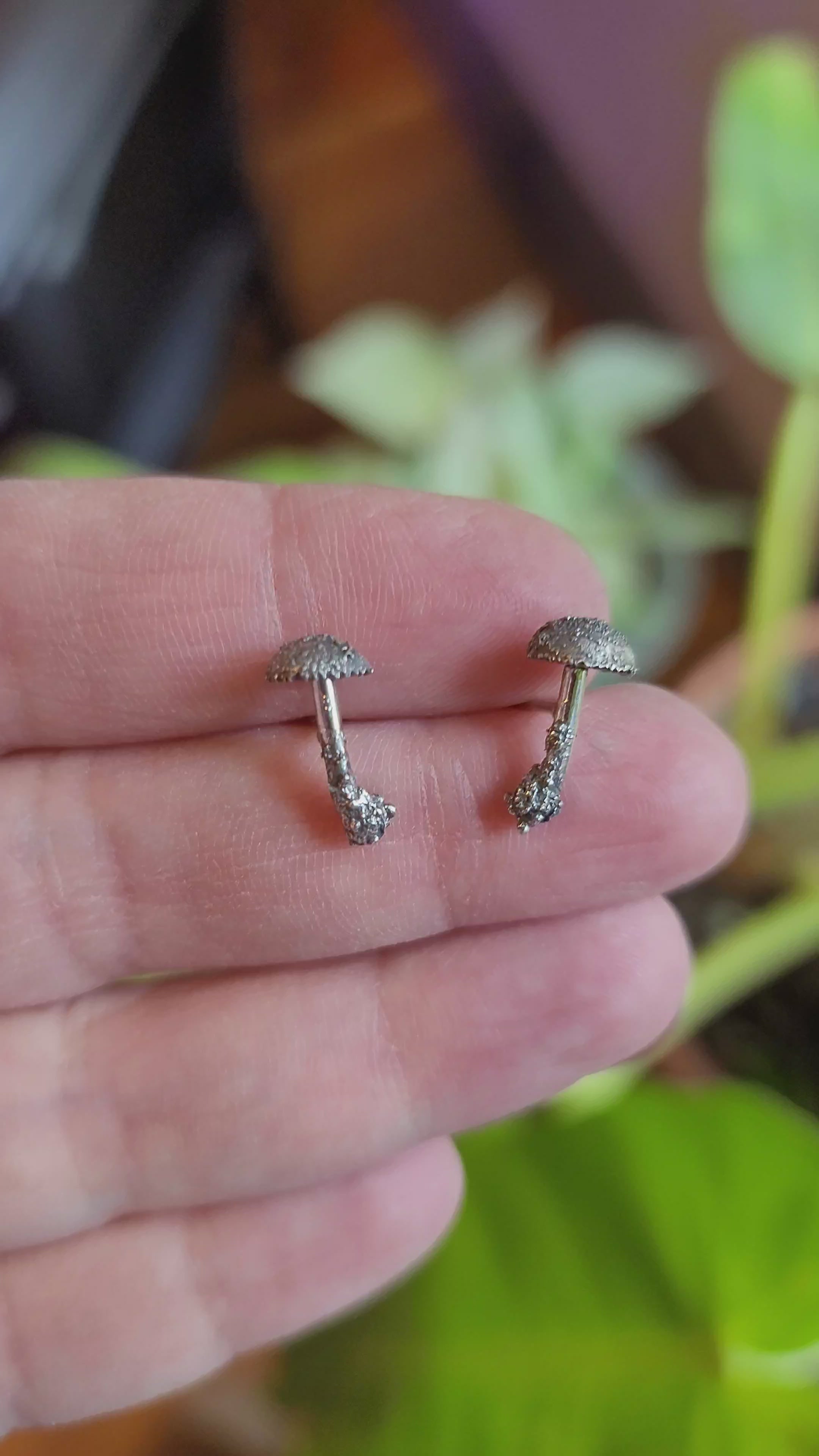 A video showing what the mushroom stud earrings look like from all angles. 