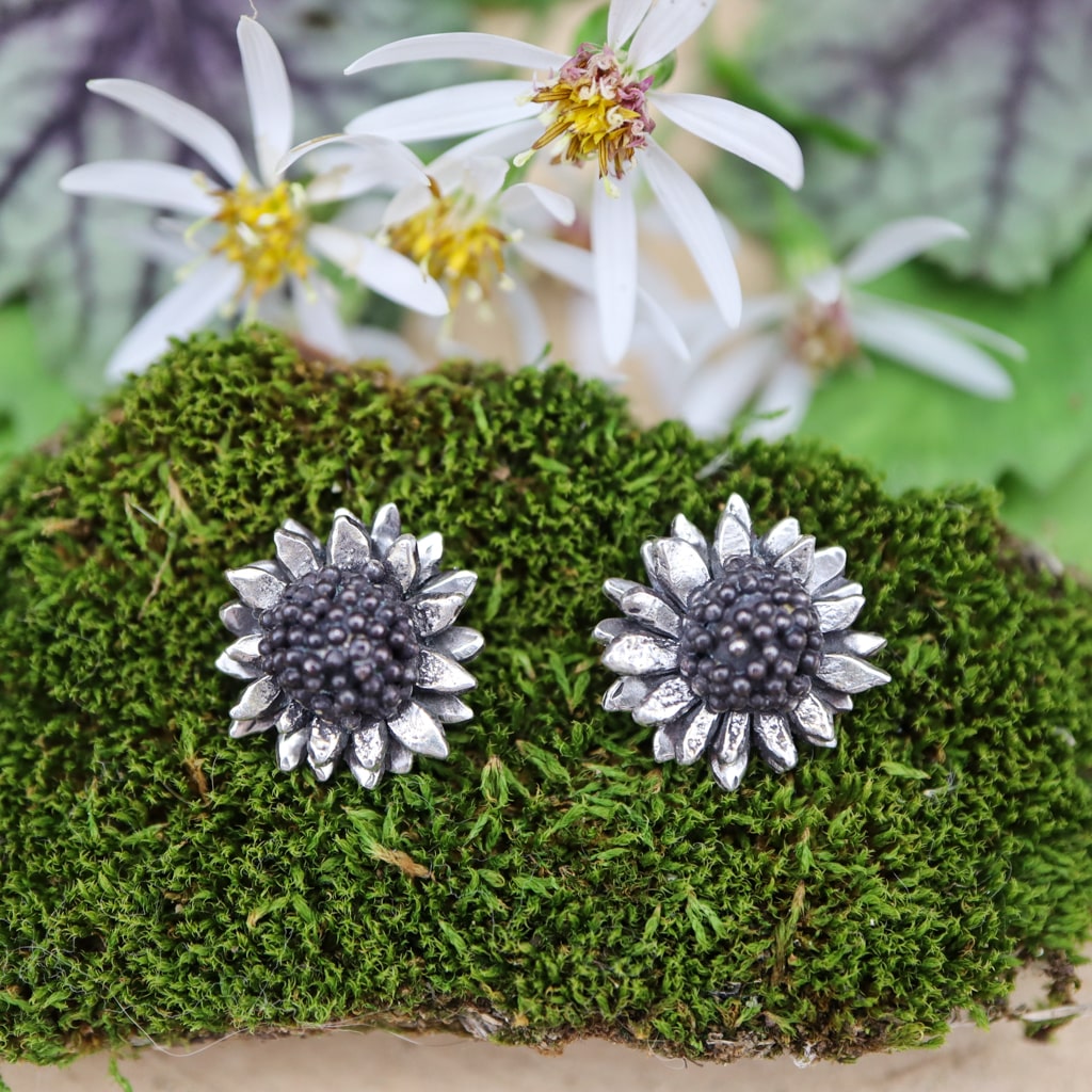 You can choose to take the leaf clusters off the back of the earrings and wear the flower faces as studs.