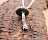 The underneath texture and gills of the mushroom necklace.
