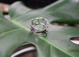The back view of the handmade sterling silver monstera obliqua leaf ring. 